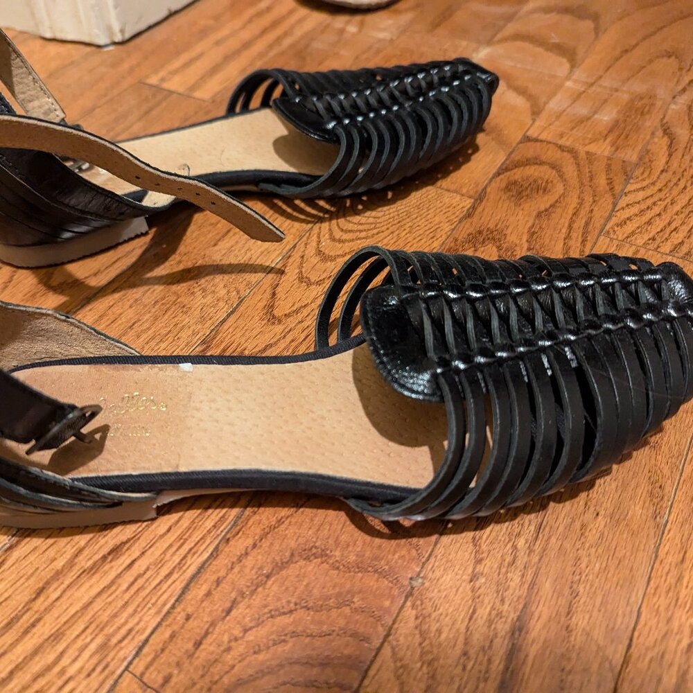 Black woven sandals